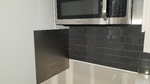 life art cabinetry white shaker door lg quartz grey subway wood tile