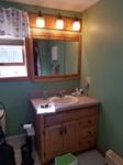pre remodel vanity and mirror