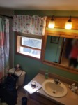 pre remodel vanity and mirror
