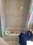 pre remodel tub with kids toys
