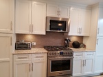 warm brown subway tile backsplash