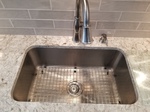 Stainless undermount sink with grid 