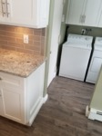 Laundry area off kitchen 