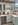 Soft green corner kitchen cabinetry display