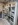 Additional countertop samples displayed on white showroom shelving